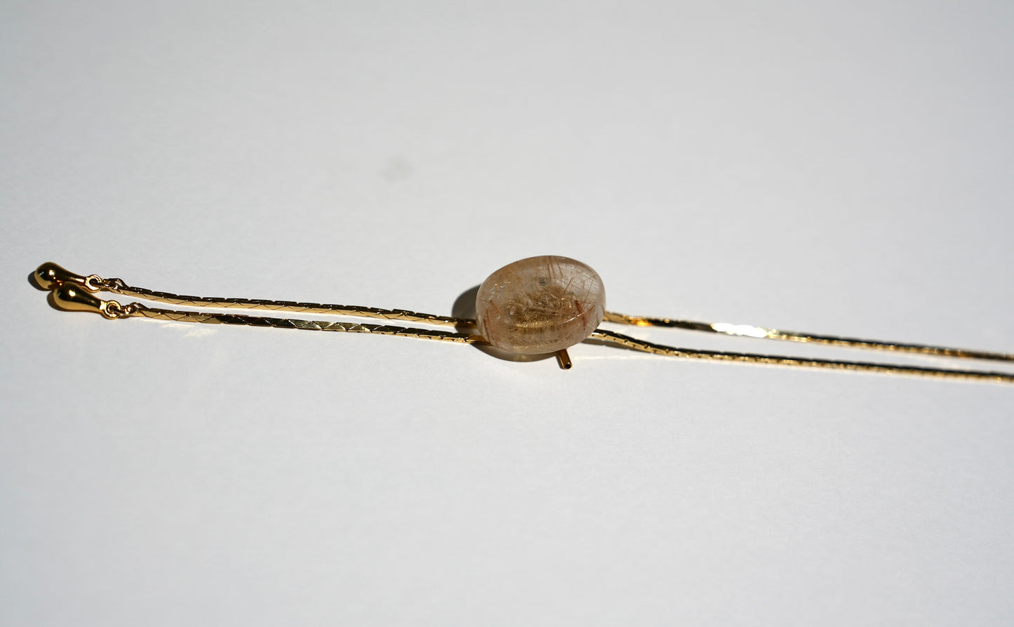1960s Gold-plated Vintage Rutilated Quartz Bolo · GLOW